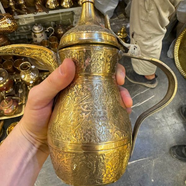 Brass pitcher at market in Iraq. Saddam’s Palace & old town Baghdad