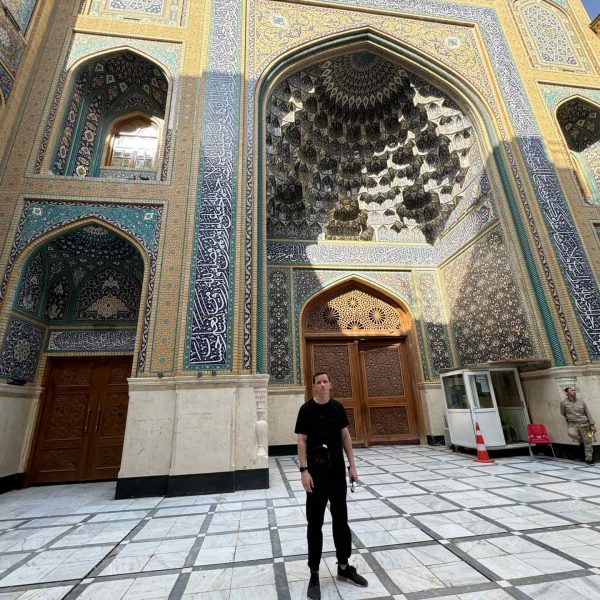 David Simpson at Imam Ali shrine in Iraq. World’s largest cemetery & sweets