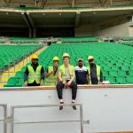 David Simpson with local workers at Basra International Stadium in Iraq. Private tour of Saddam's yacht