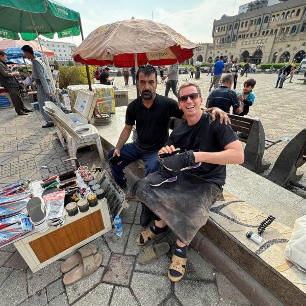 David Simpson and shoemaker at Erbil market in Iraq. Saddam's torture house, Erbil & Sulaymaniyah