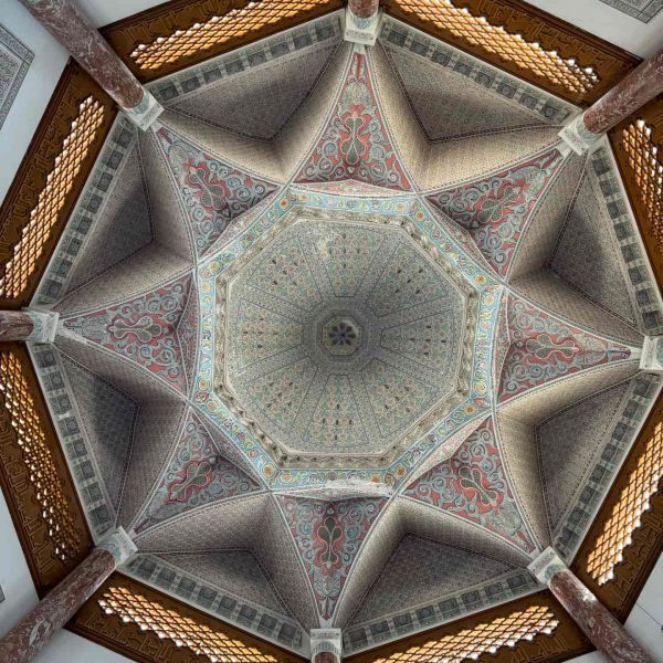 Ceiling art at rainbow mosque in Iraq. Private tour of Saddam's yacht