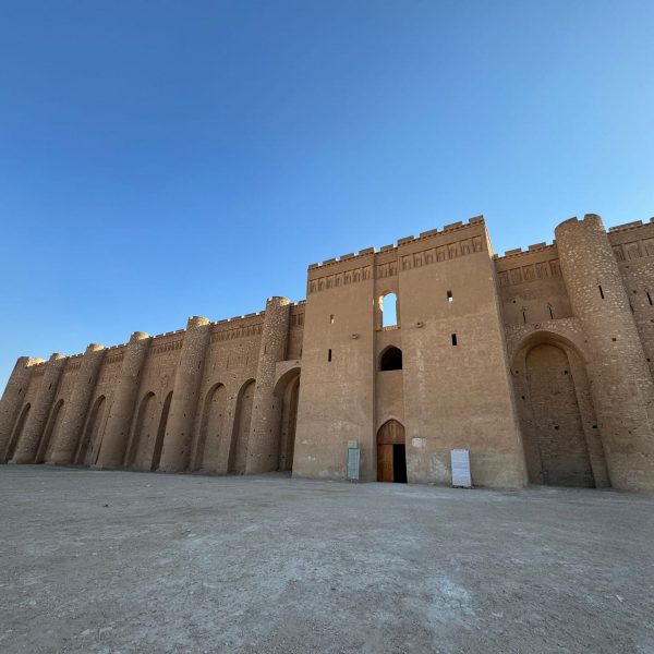 Walls of Al Khaydhar fortress in Iraq. World’s largest cemetery & sweets
