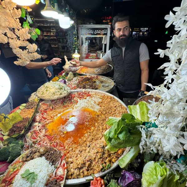 Local food vendor at market at Erbil in Iraq. Saddam's torture house, Erbil & Sulaymaniyah