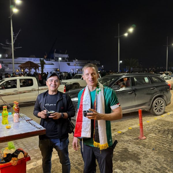 David Simpson and local at the pier of Saddam's yacht in Basra in Iraq. Iraq v Indonesia in Basra